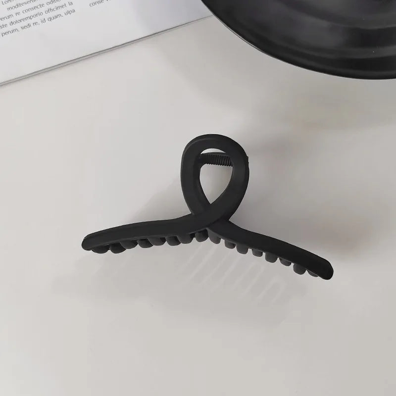 Elegant Black Geometric Plastic Hair Claw