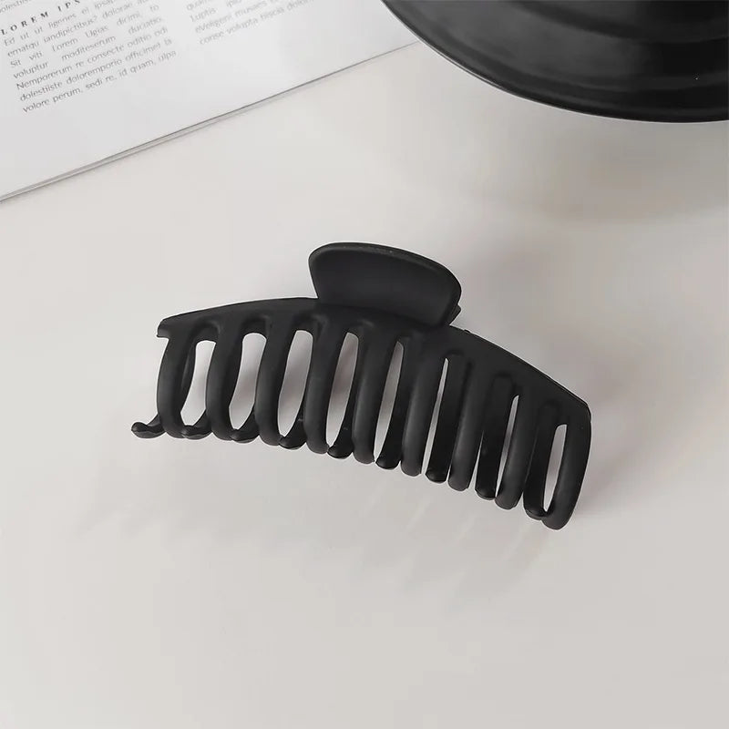 Elegant Black Geometric Plastic Hair Claw